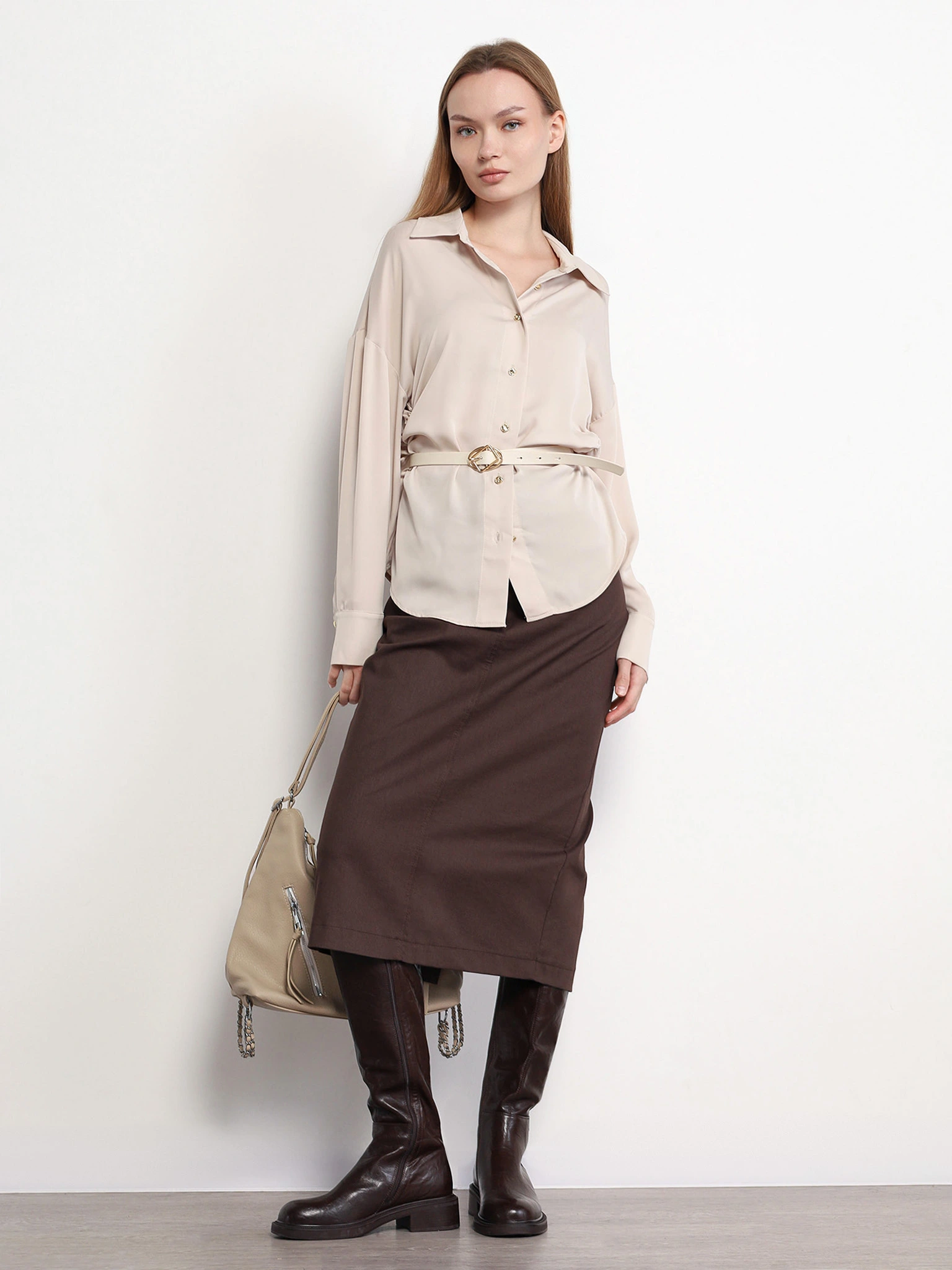 Блуза бежевого цвета с рюшами